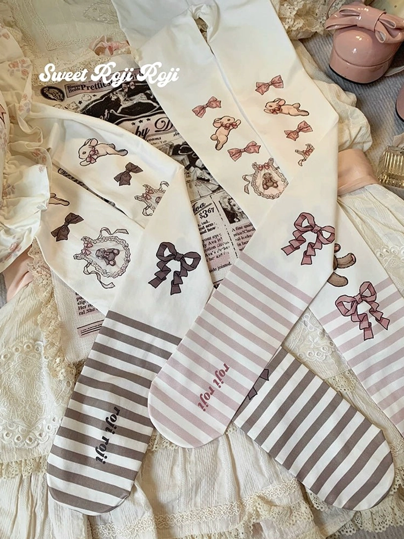 Close-up overhead flat lay of sweet lolita velvet tights showing brown and pink stripe color variants with detailed bear small bow and wreath prints vintage aesthetic styling