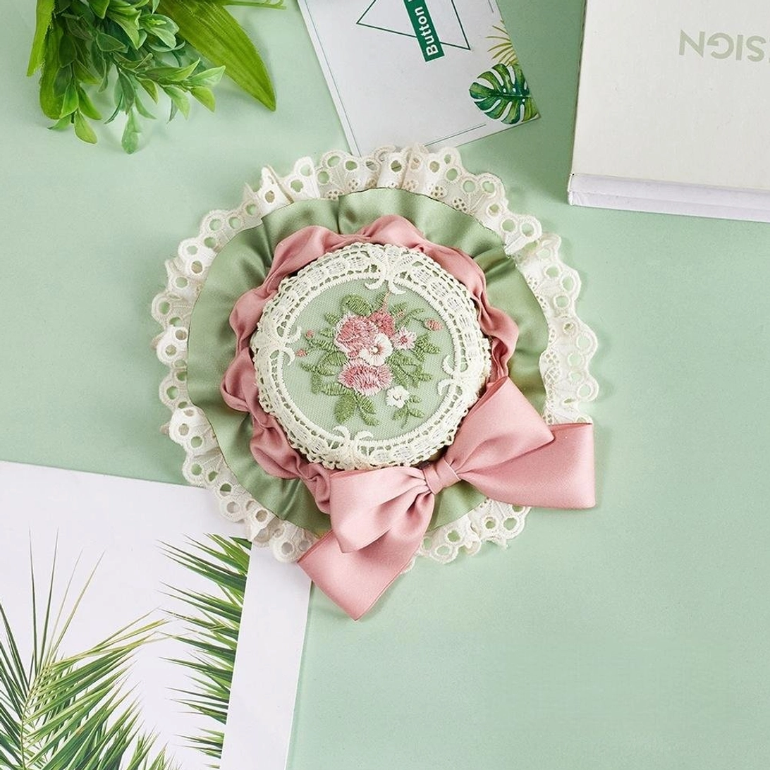 Sweet Lolita floral embroidery top hat in pink-green color variation with matching satin bow, hand-embroidered florals, and white lace trim details