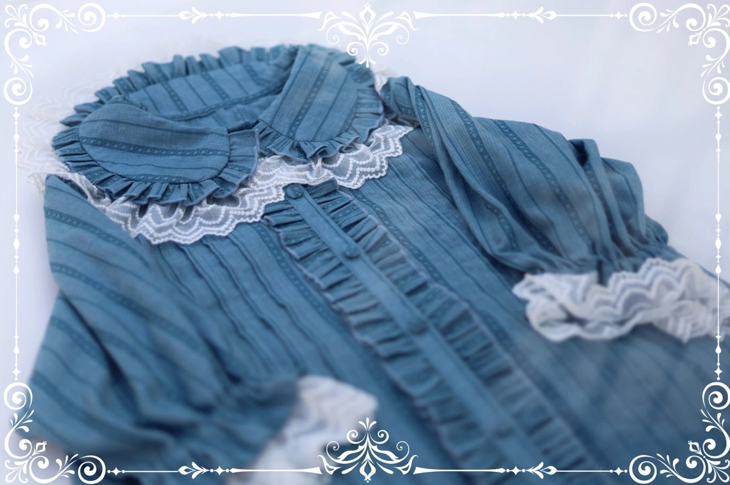 White lolita peter pan collar short sleeve blouse puff sleeves lace cuffs button-down placket detail shot view