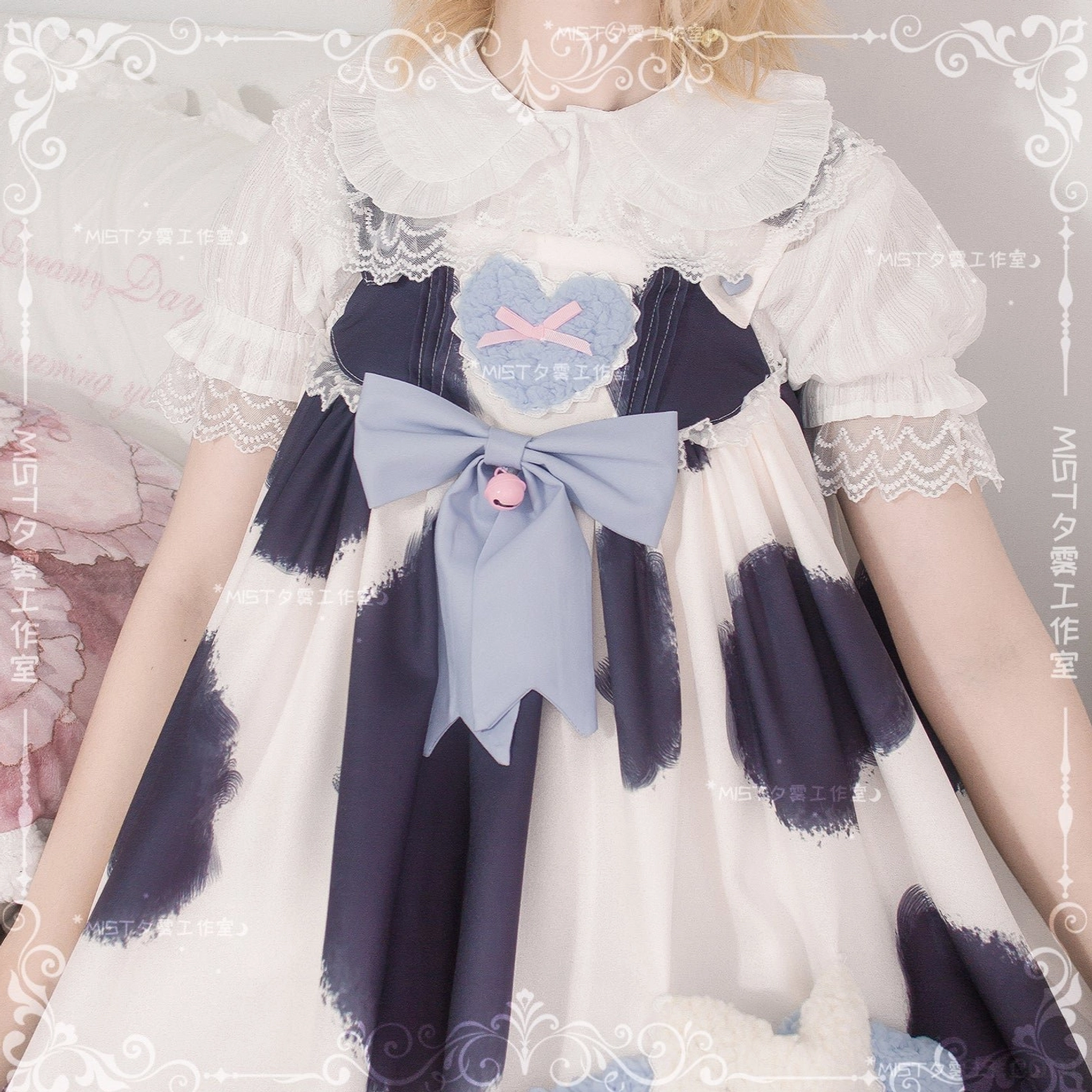 White lolita peter pan collar short sleeve blouse puff sleeves lace trim pinstripe texture flat lay display