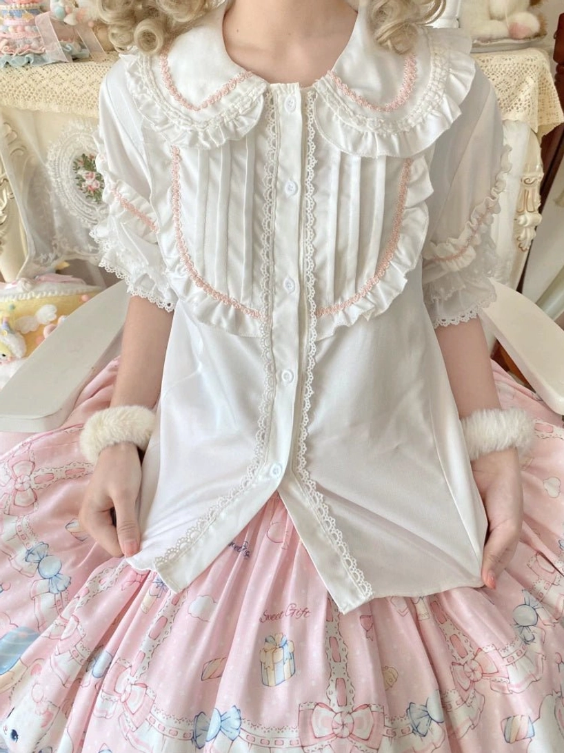 sweet lolita blouse white with pink striped ruffled lace trim worn with pink printed skirt fluffy wrist cuffs cute home scene pastel aesthetic