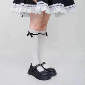 Sweet lolita white lace bow calf socks front full leg display view with black platform Mary Jane shoes and black-white lace maid skirt coordinate