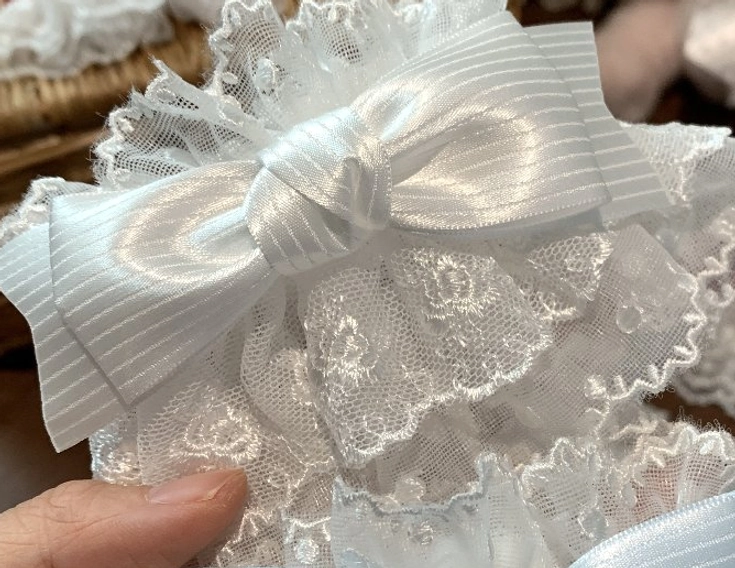 White lace Sweet Lolita wrist cuffs with white satin bow minimalist elegant Lolita style