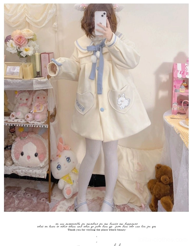 Sweet lolita wool winter coat front mirror selfie view casual pose model holding smartphone front details color scheme blue sailor collar white pom-poms heart pockets