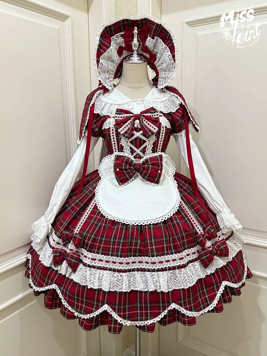 Tartan plaid lolita dress fabric detail close-up showing weave pattern, color vibrancy, and material quality of 65% polyester 35% cotton blend