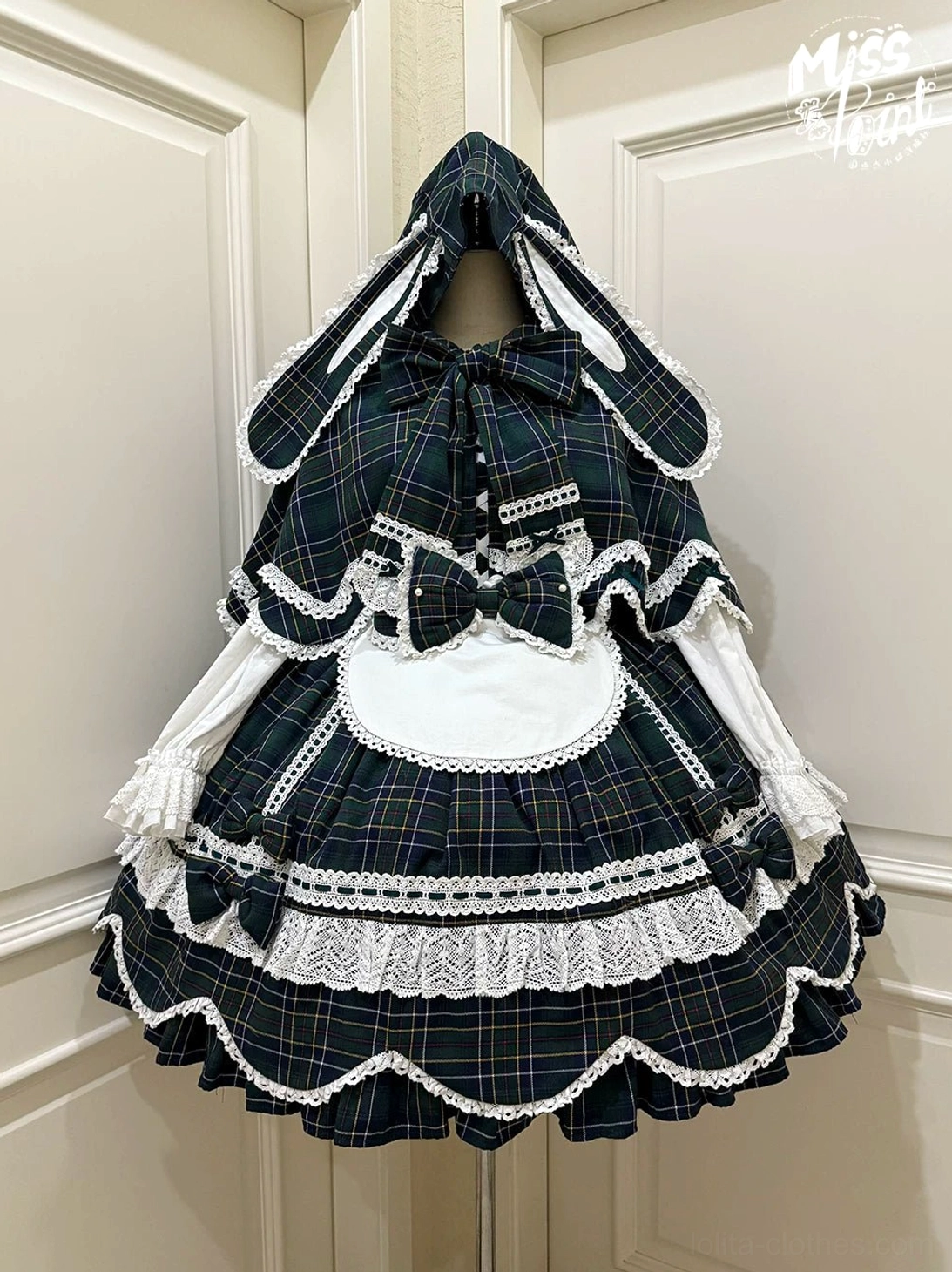 Tartan plaid lolita one-piece dress showing petal-shaped hem from multiple angles demonstrating dimensional scalloped design feature