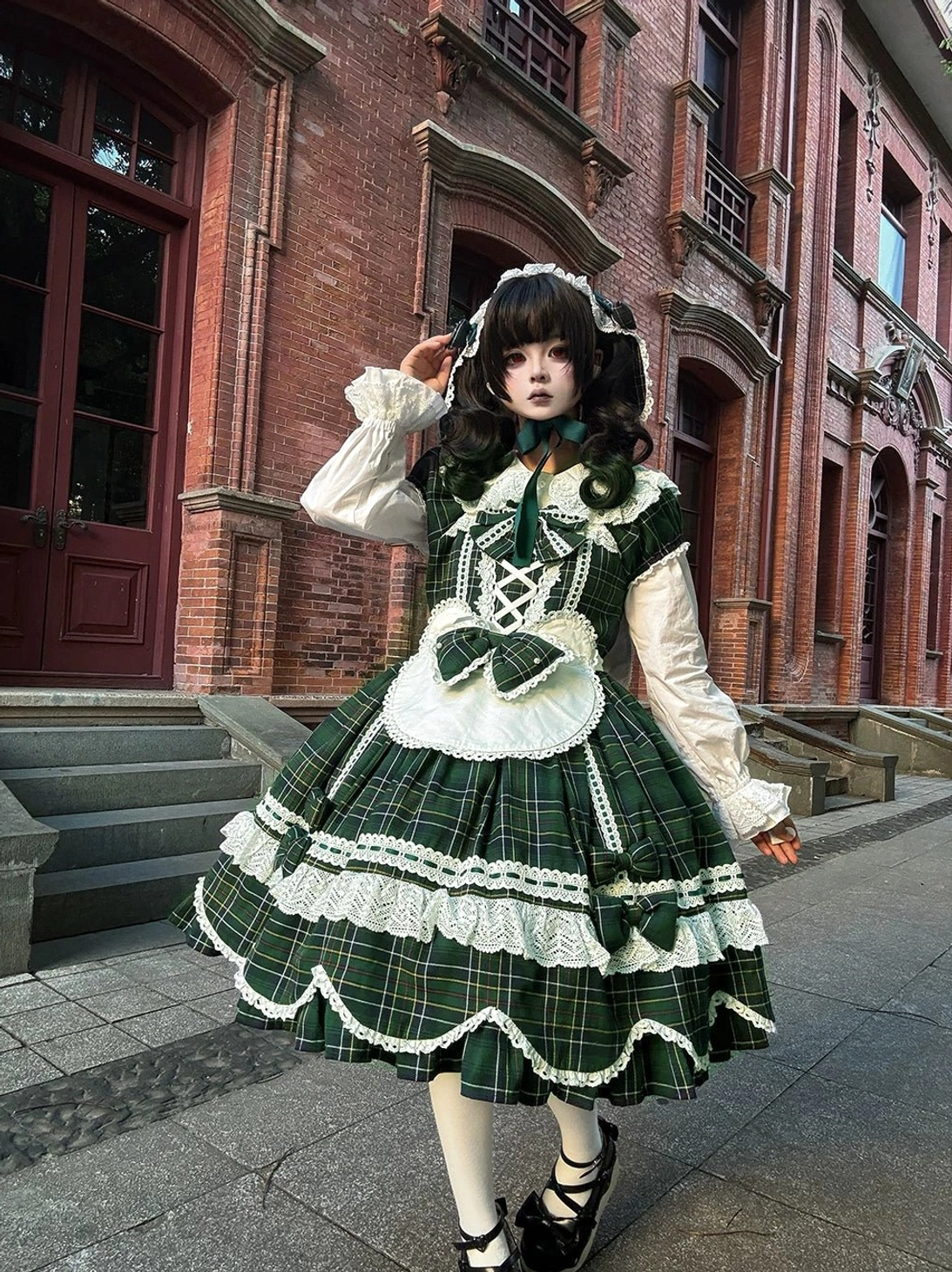Tartan plaid lolita one-piece dress showing pearl beading detail on waist bow and refined embellishment quality