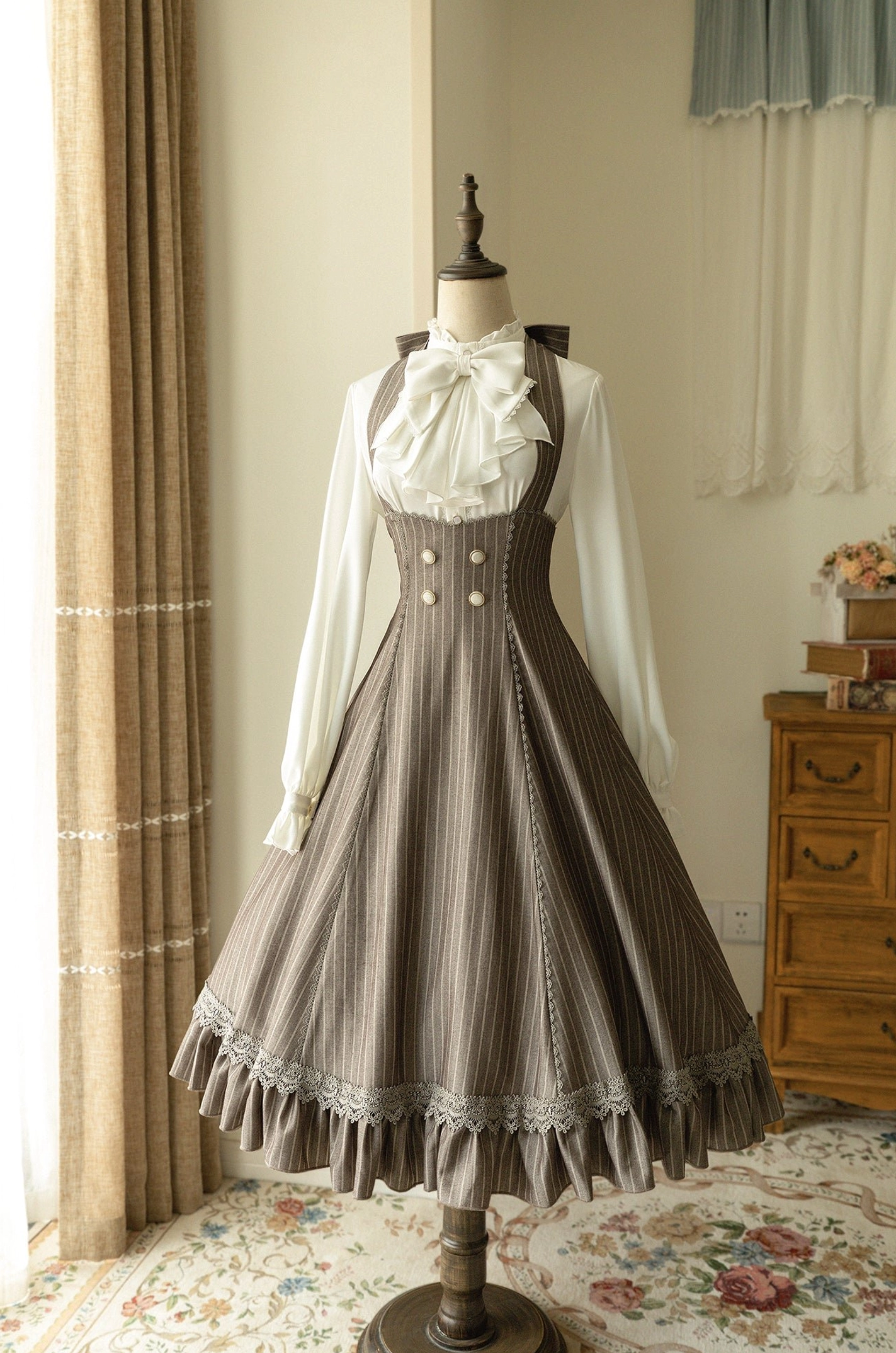 Taupe brown striped vintage halter jumper skirt dress with lace trimmed ruffled hem, front view dress form display retro wooden furniture, classic lolita style