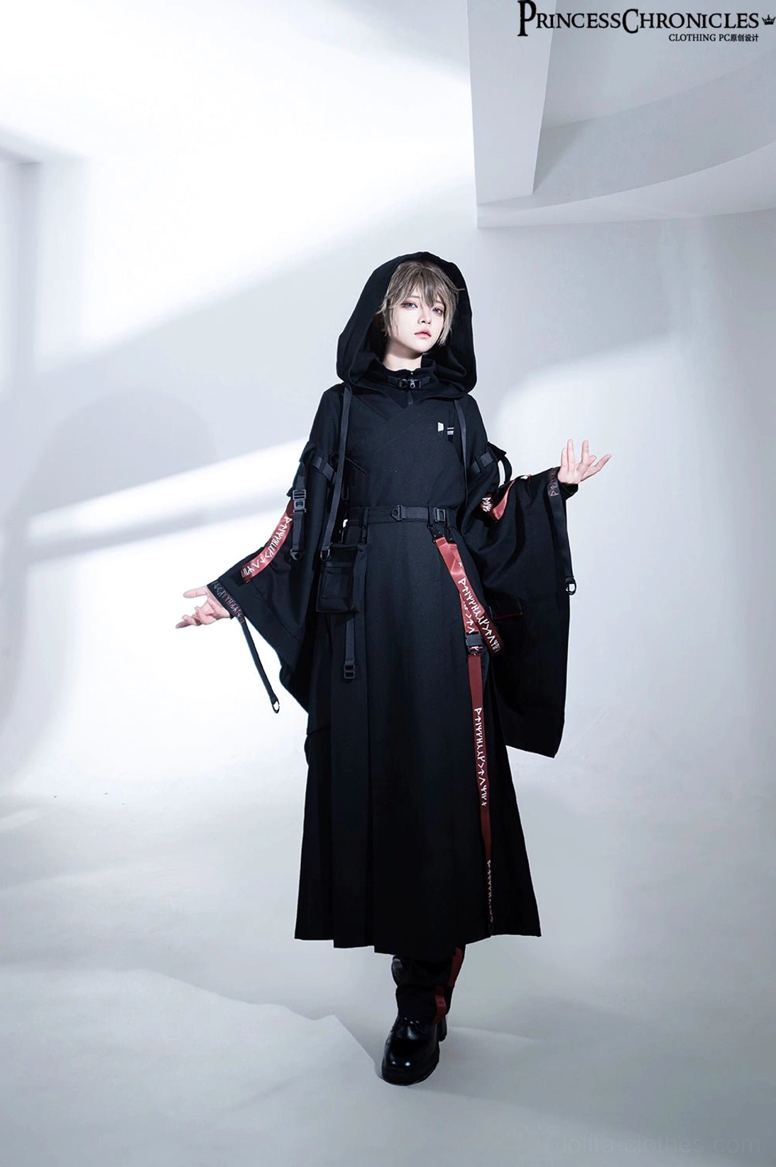 Techwear outfit rear view showing inner shorts visibility through side slit and back silhouette