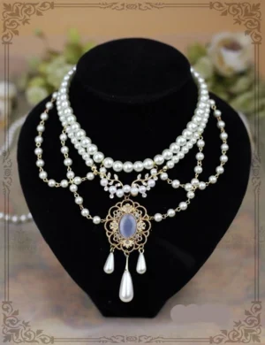 Theresa vintage pearl wedding Lolita necklace multi-strand tiered pearls gold filigree frame blue gemstone teardrop pendant front display black mannequin
