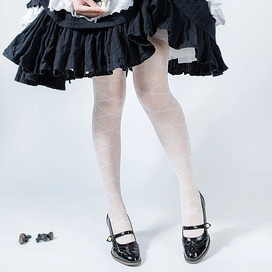 subtle white crisscross woven lolita full length pantyhose with fine lattice pattern worn with black ruffled lolita skirt