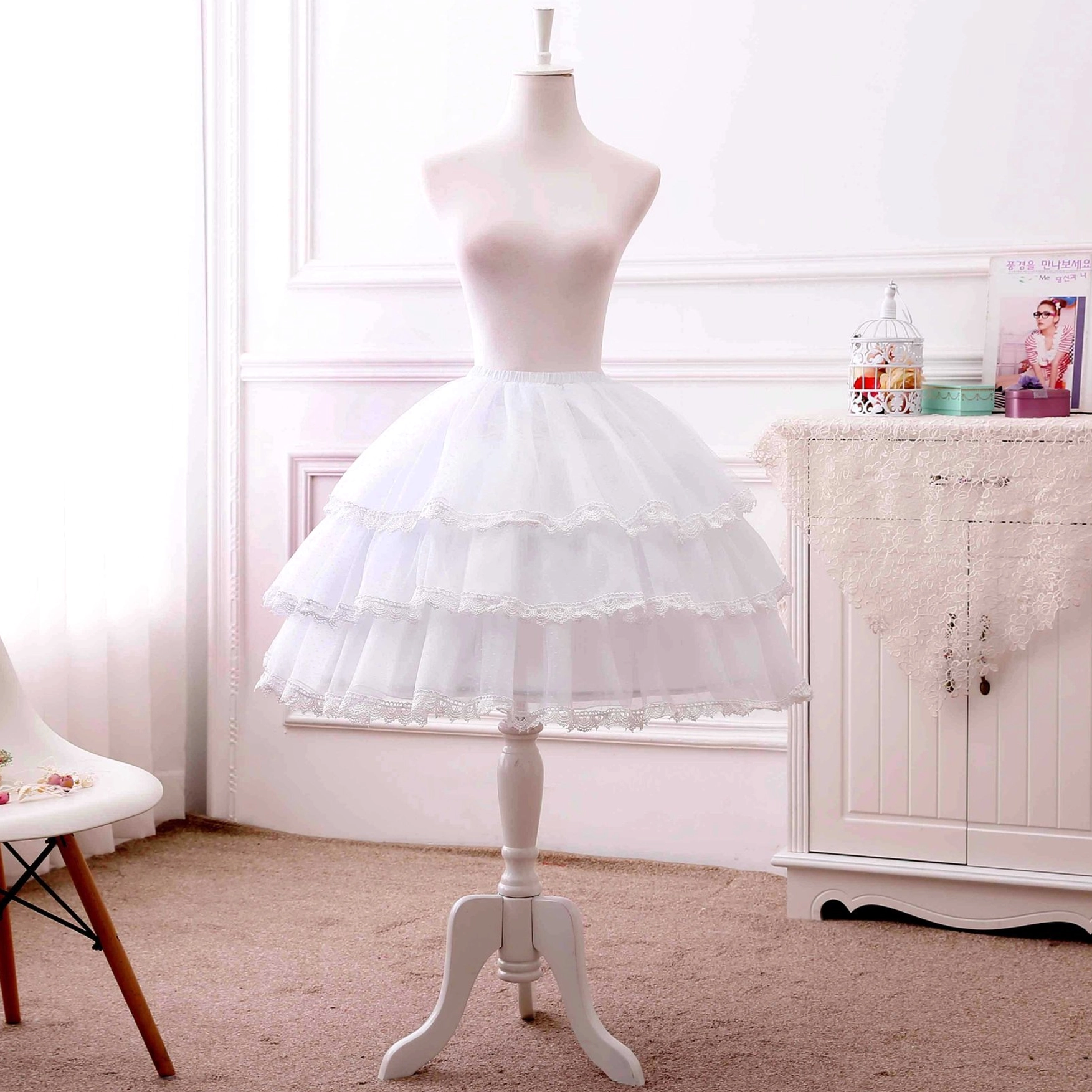 three-tier white lolita petticoat full front display wooden mannequin soft tulle layers lace edging hem details indoor room