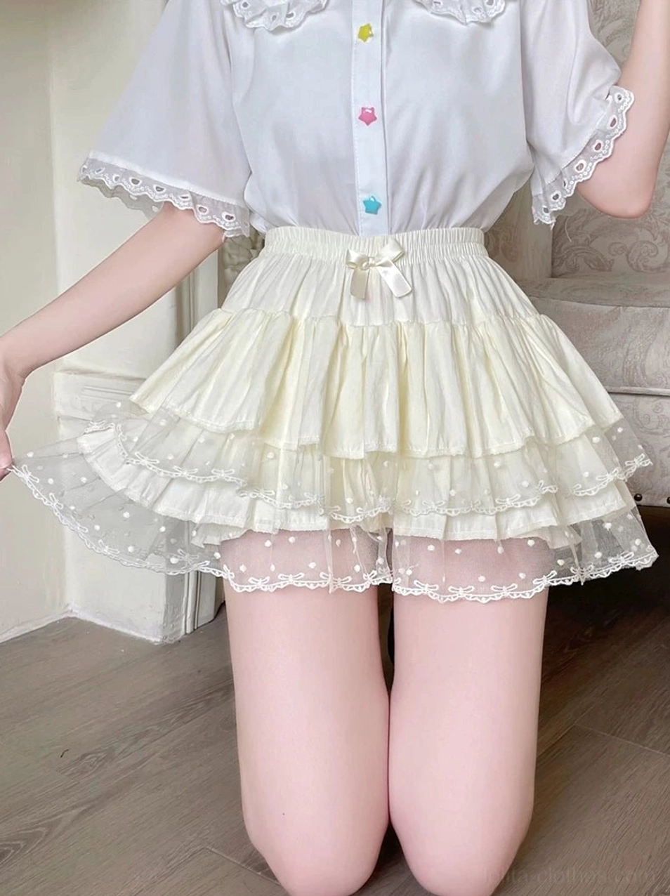 Tiered bloomers Lolita style showing waist bow attachment point elastic waist adjustability comfort features and secure fit design for all-day wear at conventions and events