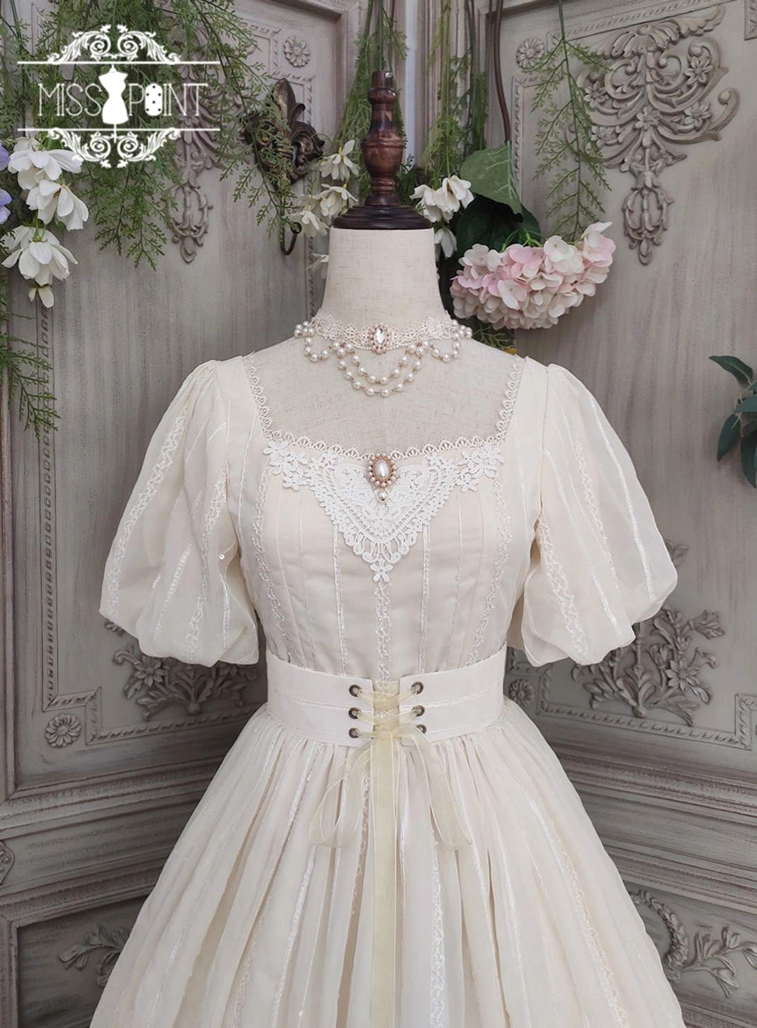 Tulip classic lolita short sleeve dress ivory variant standing view square collar puff sleeves waist detail petal hem embroidered
