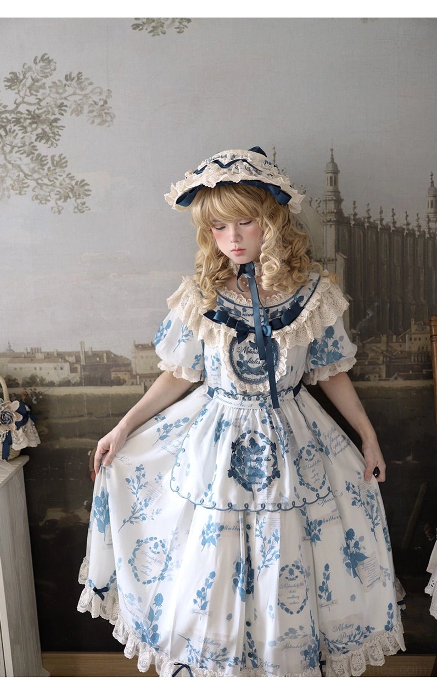Full-body front view of two-piece Lolita camisole and skirt set with detachable shoulder bow pins, demonstrating modular styling versatility for country Lolita coordinates