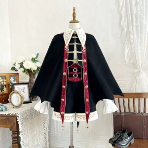 Vampire Ouji Lolita bat-shaped cape three-piece set front view on dress form showing black jacket with burgundy trim gold embroidery ruffled shirt and decorative shorts
