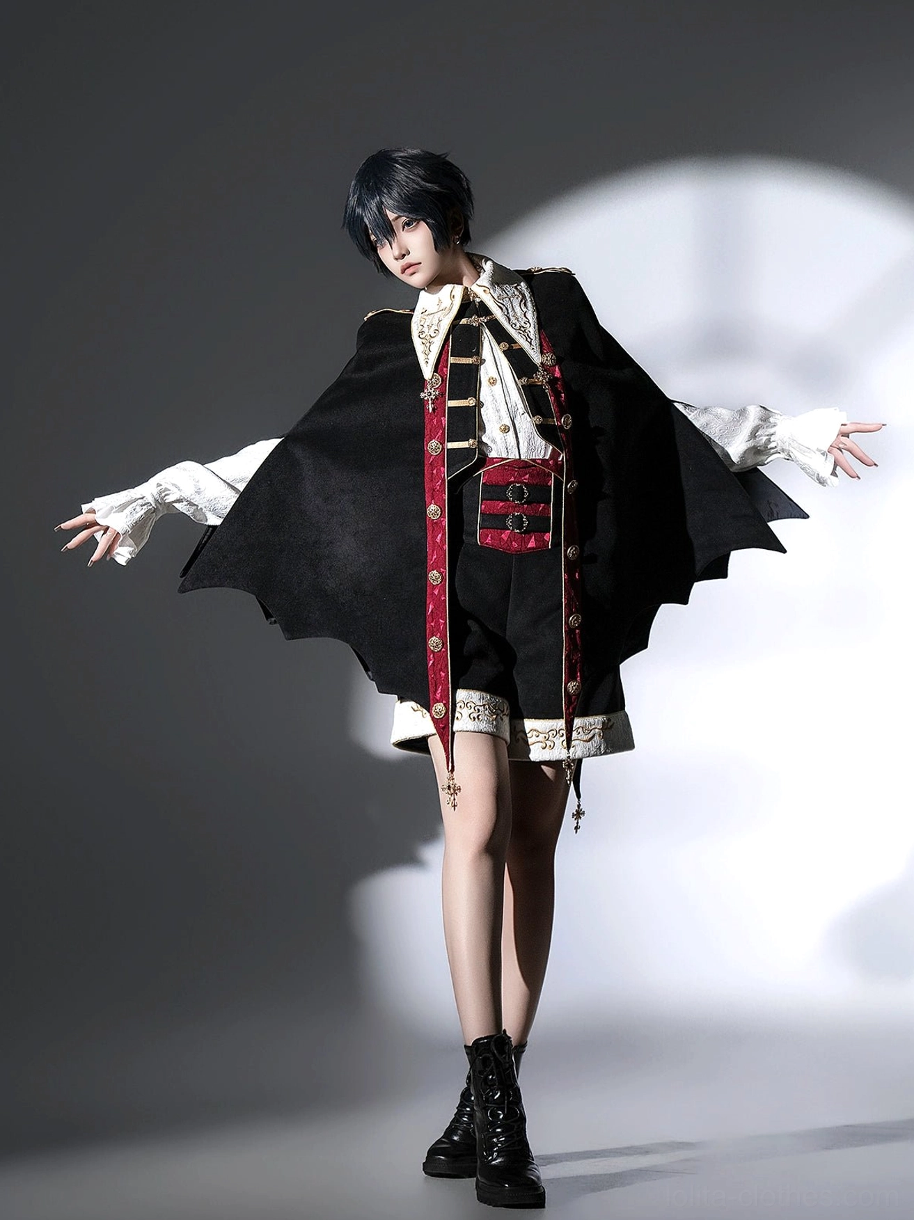 Vampire Ouji Lolita bat cape set close-up detail shot of front placket burgundy trim cross embroidery and gold buttons