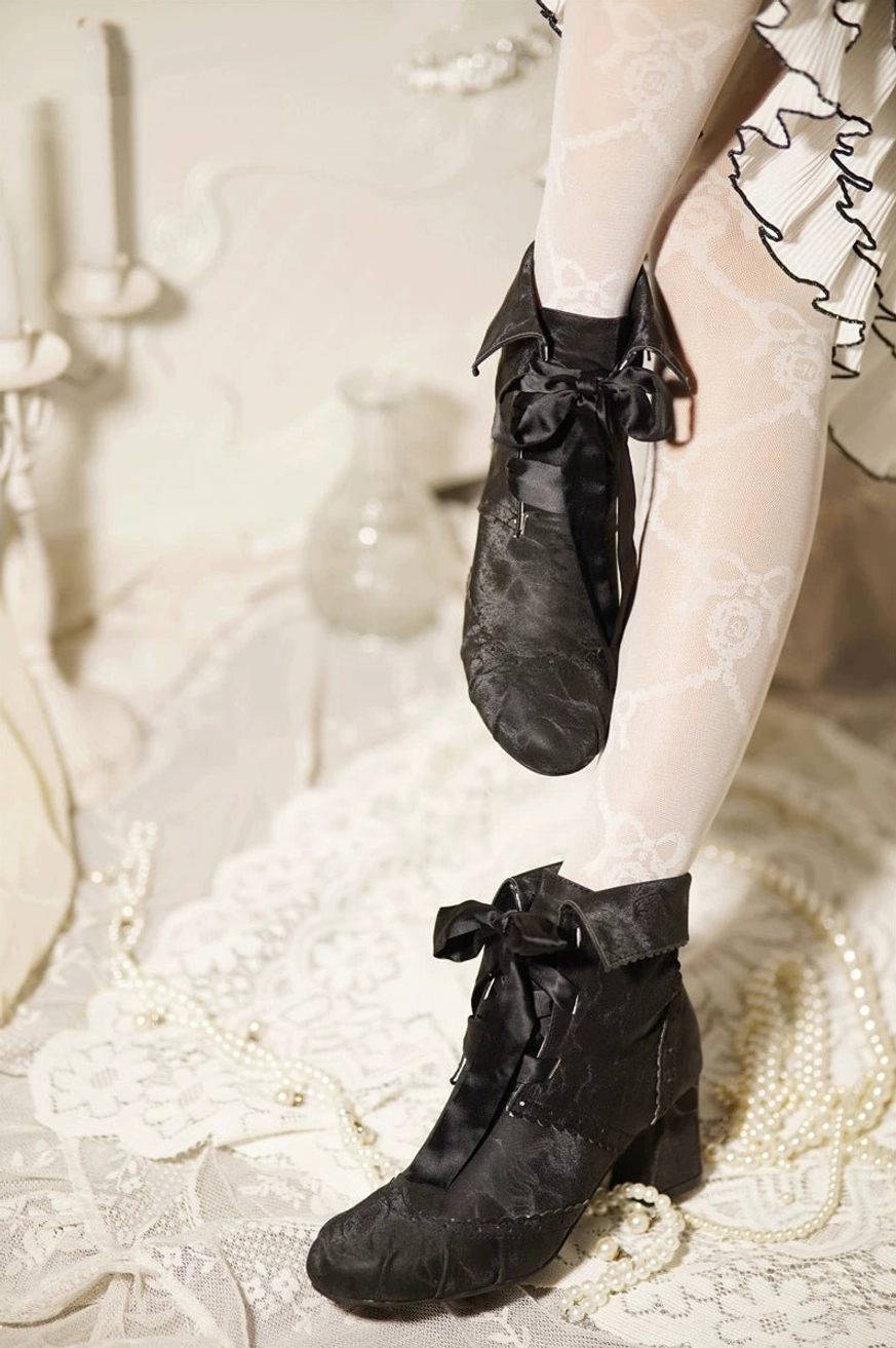 Victorian lolita ankle boots product detail showing block heel construction microfiber upper and non-slip rubber sole from overhead perspective
