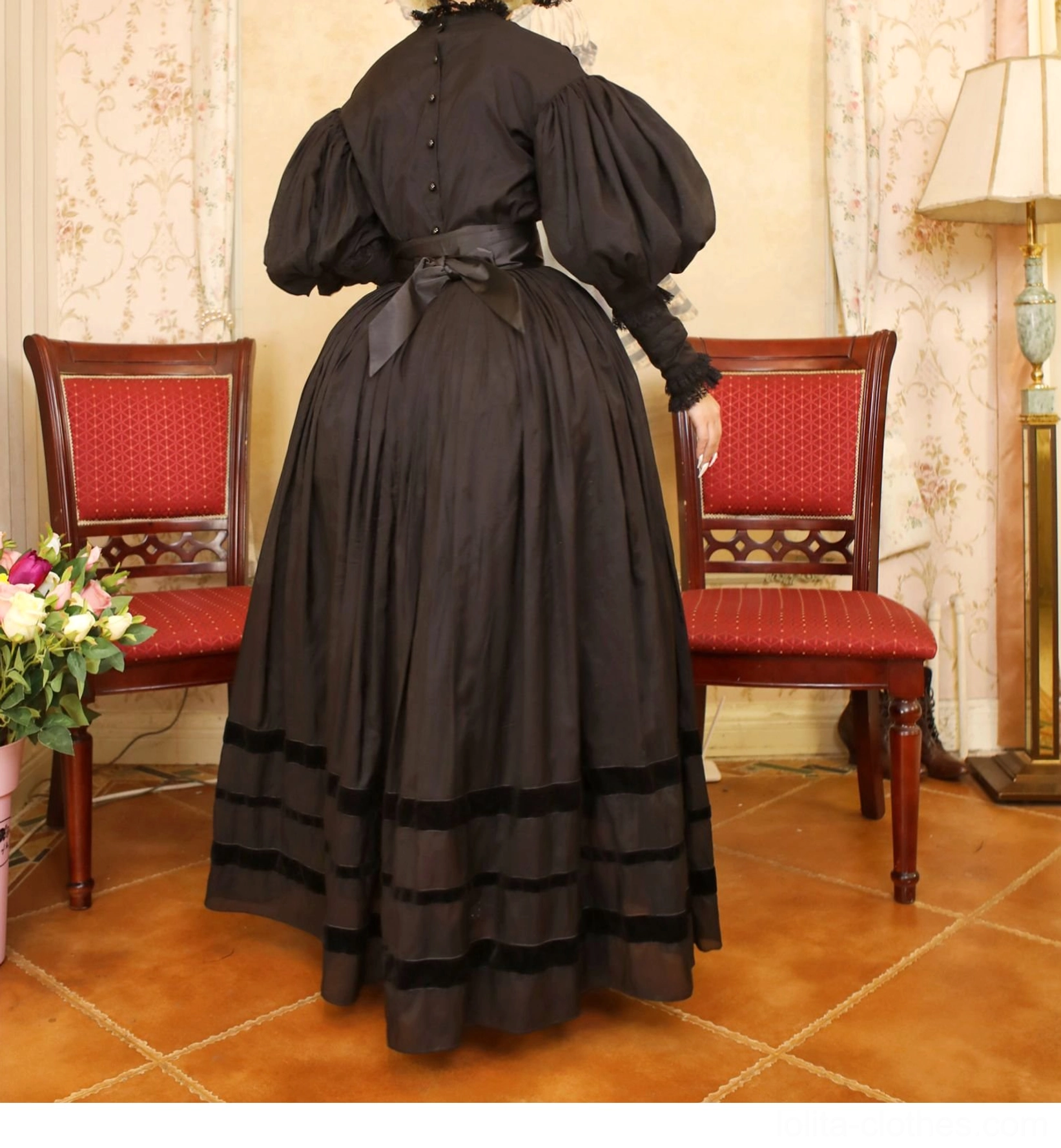 Victorian Lolita blouse detail showing intricate handmade patchwork, circular hollow-out joining technique, fine lace embroidery on bust, and oversized bubble sheep-leg puff sleeve construction