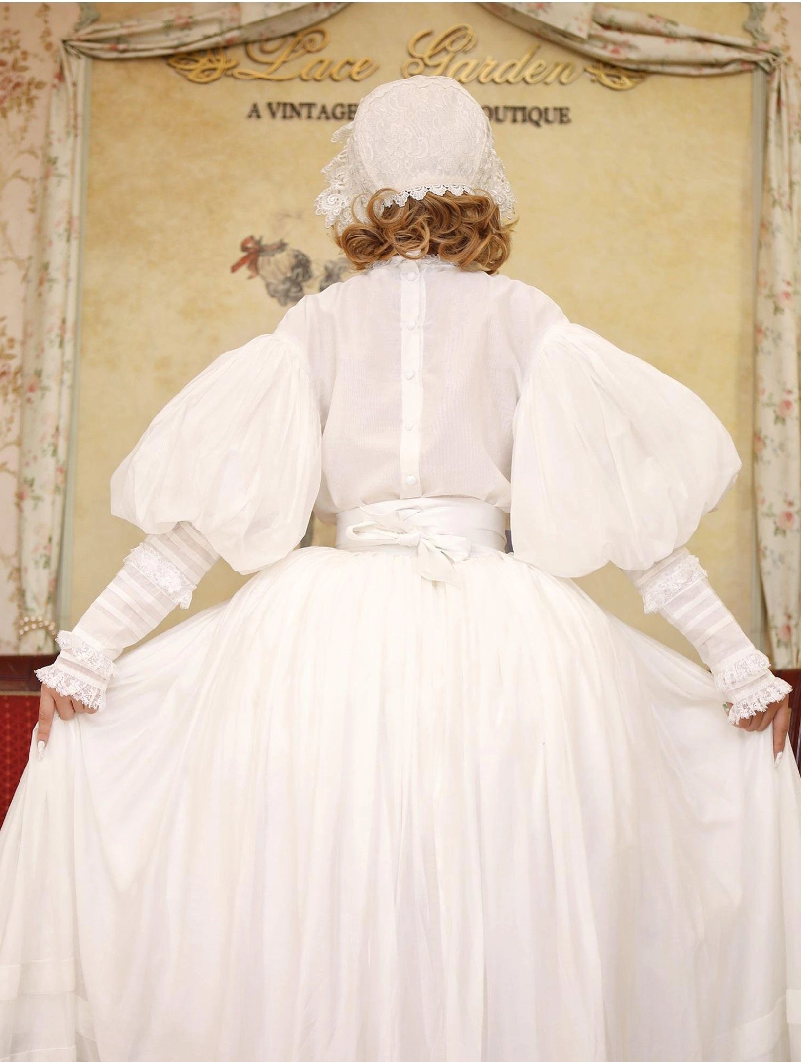 Victorian Lolita chest and bust area showing fine lace appliqué embroidery, circular hollow-out joining pattern, and ruffled high collar detail on white blouse