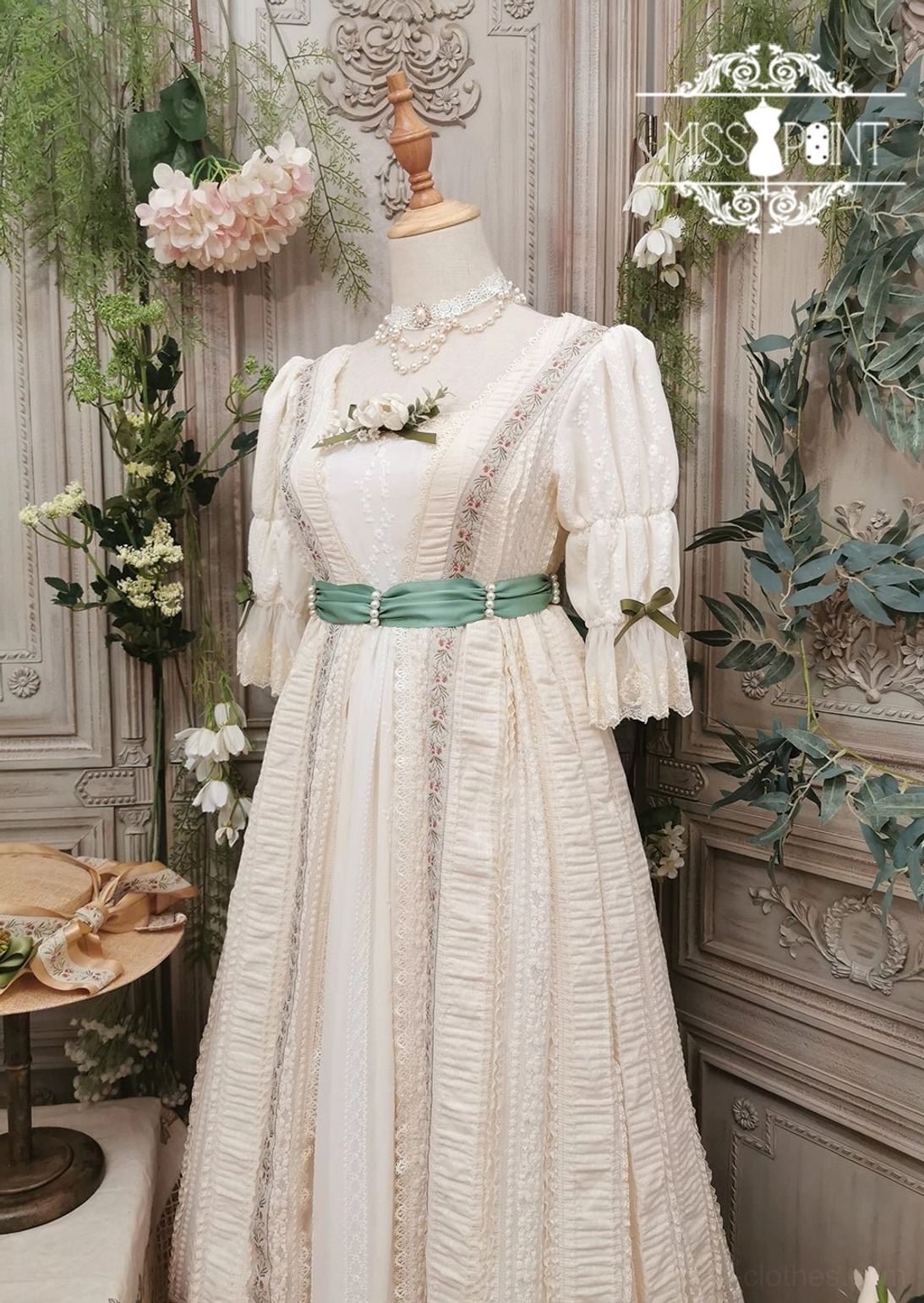Vintage-inspired lolita ribbon belt with pearl and floral details displaying artisanal handcrafted quality and retro aesthetic