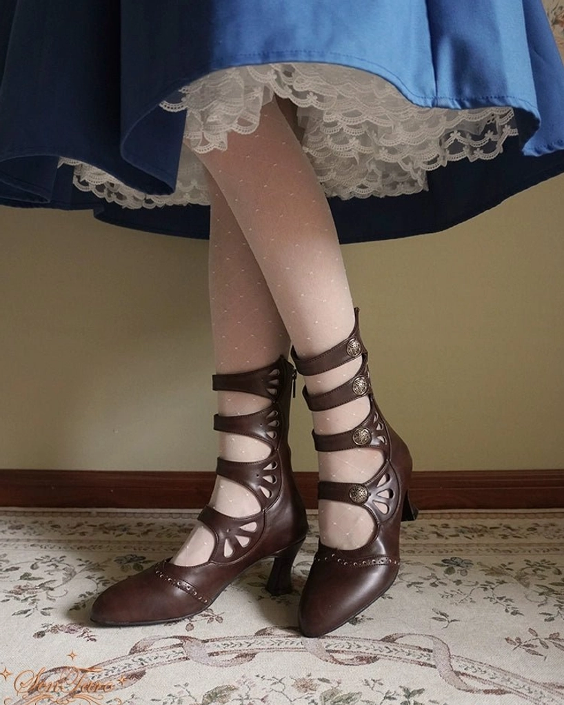 Vintage-inspired Mary Jane Lolita footwear with four-strap system and floral hollow-out design detail view