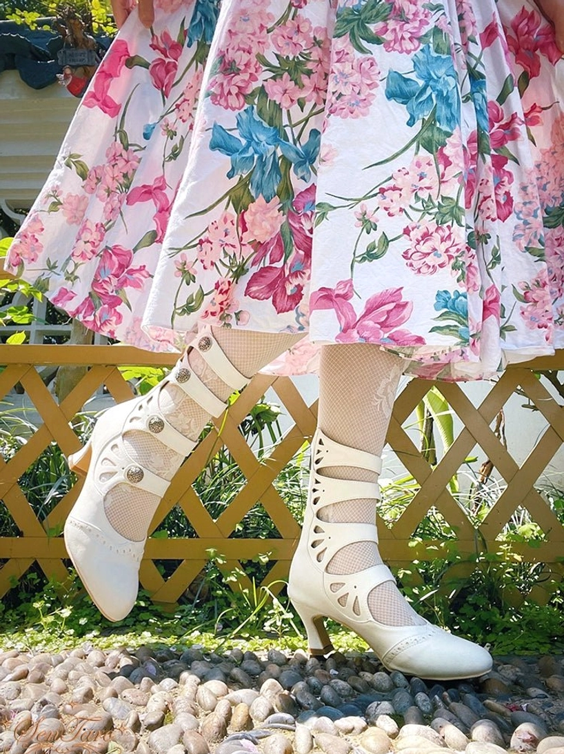 Vintage-inspired Mary Jane Lolita footwear with pointed toe wine glass heel and multi-strap buckle embellishment