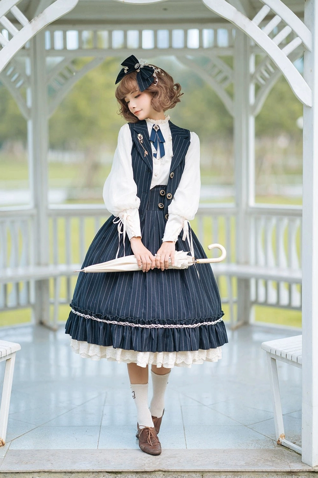 Vintage-inspired jewelry and accessory coordination with striped lolita fishbone skirt