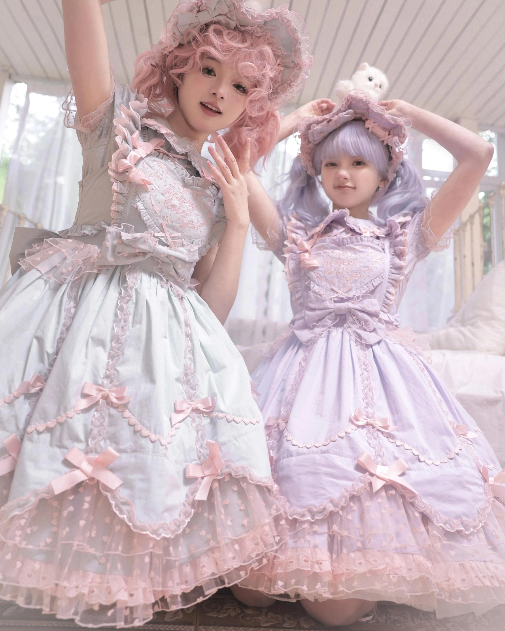 Low angle view of vintage Lolita jumper dress highlighting ruffled peter pan collar and petal-shaped hem detail