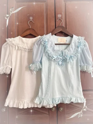 Vintage lolita short-sleeve peter pan collar blouses in beige and baby blue with sheer floral lace collar hanging display wooden wardrobe