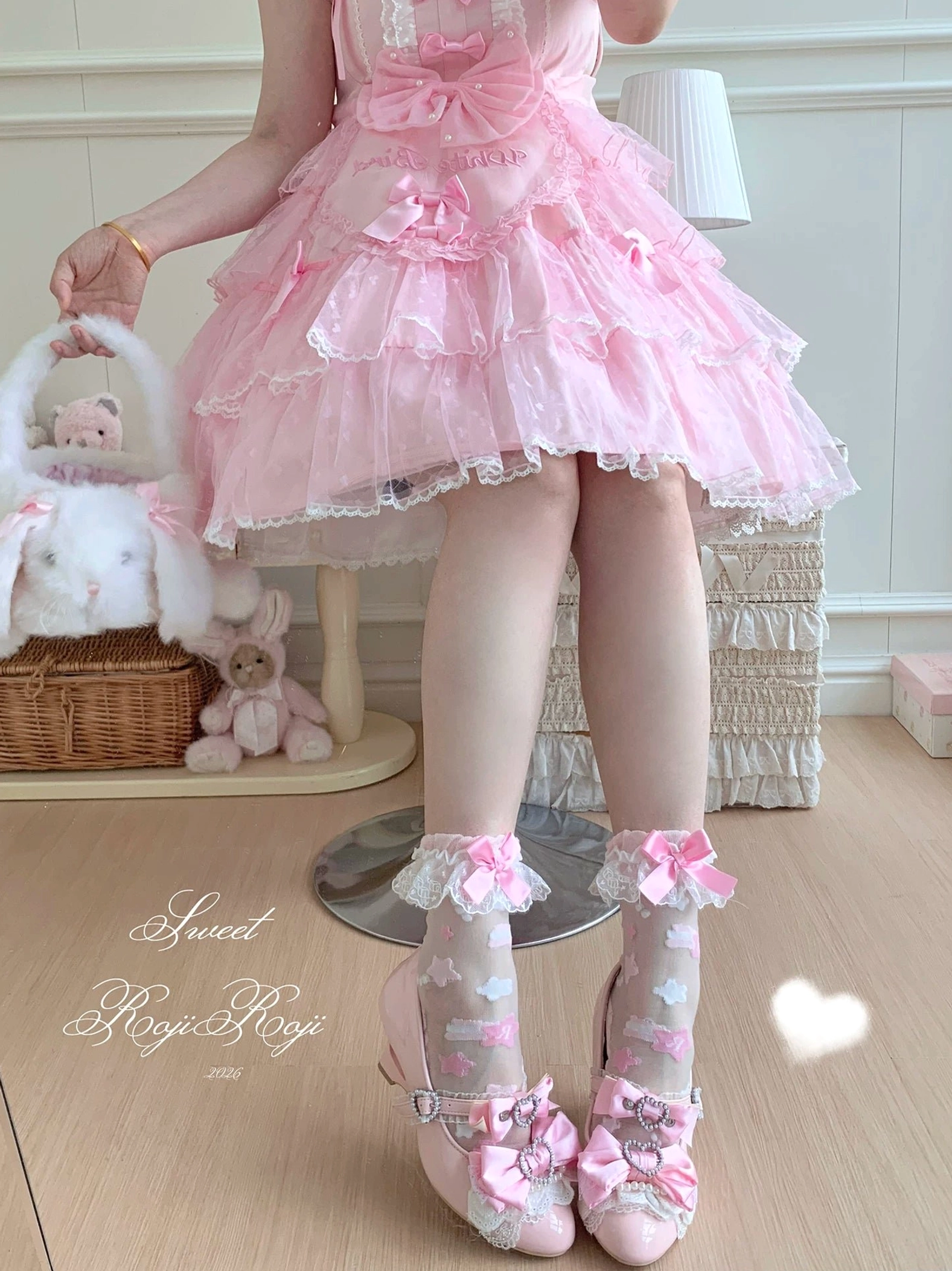 Vintage aesthetic lolita socks with pastel star embroidery lace cuff and satin bow on retro desktop