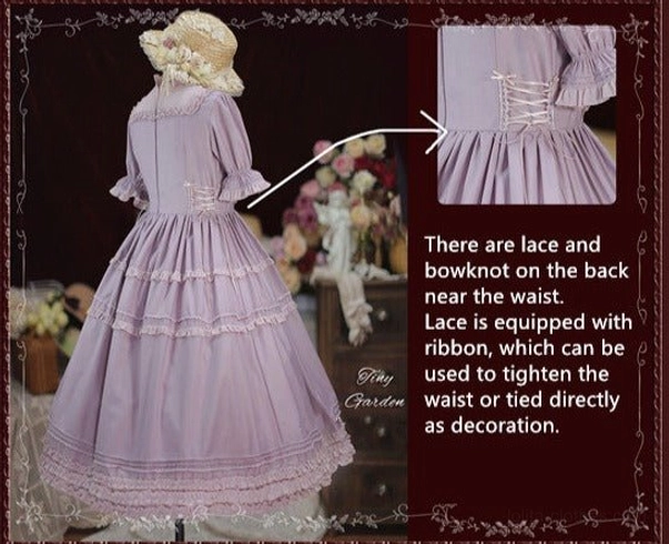Vintage lolita dress in wine red shown from front angle with tiered ruffles and classic lolita silhouette on dress form