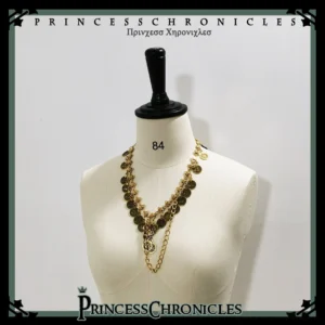 Multi-layered gold coin Ouji Lolita necklace with clustered coin charms and decorative central pendant shown on mannequin alternate angle