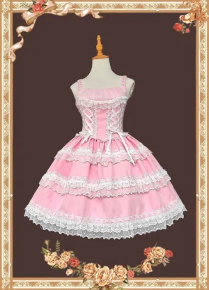 Pink vintage lolita JSK dress with square straps and ribbon lace-up front tiered white lace trimmed skirt on mannequin