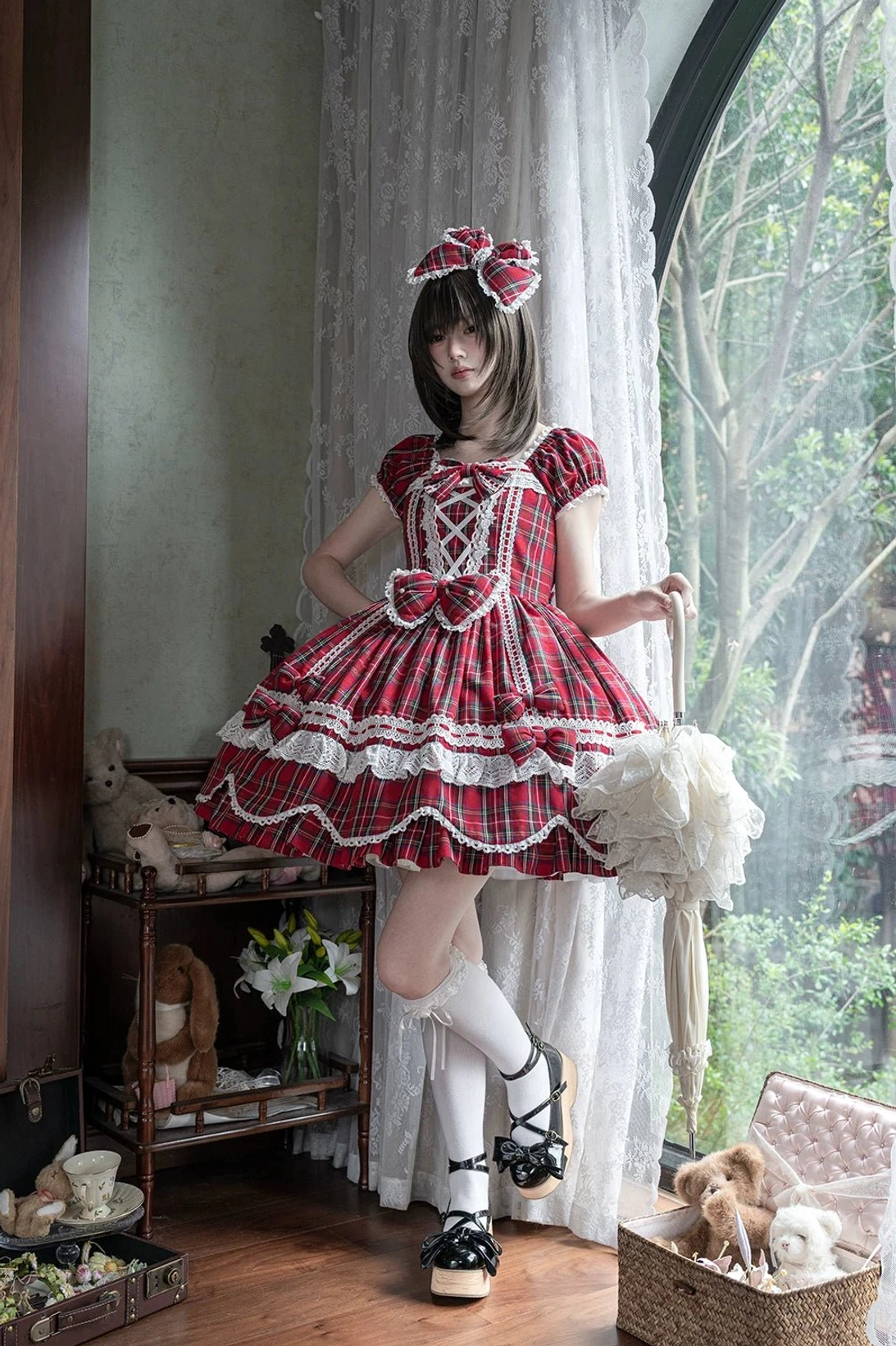 Vintage plaid lolita one-piece dress front view showing complete design layout, bow placement, and petal hem silhouette