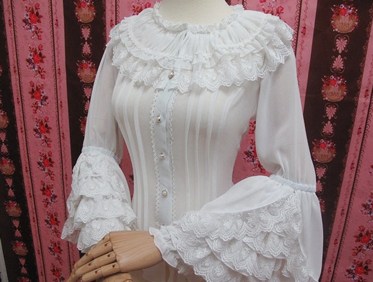 White retro long-sleeve lolita blouse with pearl-adorned front buttons and layered lace trumpet sleeves front display on mannequin