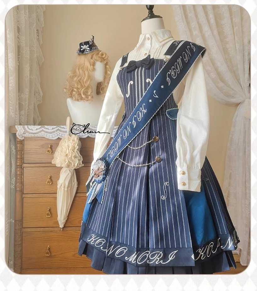 Fabric detail close-up of violin preppy Lolita salopette showing TR suit stripe material quality vertical pinstripes texture