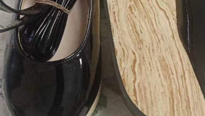 Close-up detail shots of black glossy patent leather wa lolita platform Mary Jane shoes showing leather texture, visible simulated wood-grain platform heel, insole edge details, and craftsmanship quality on plain dark background