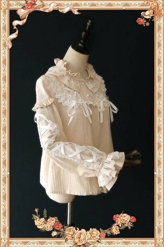 Warm Tea beige long-sleeve lolita blouse three-quarter view with cutout ribbon straps lace chest overlay and bow accents