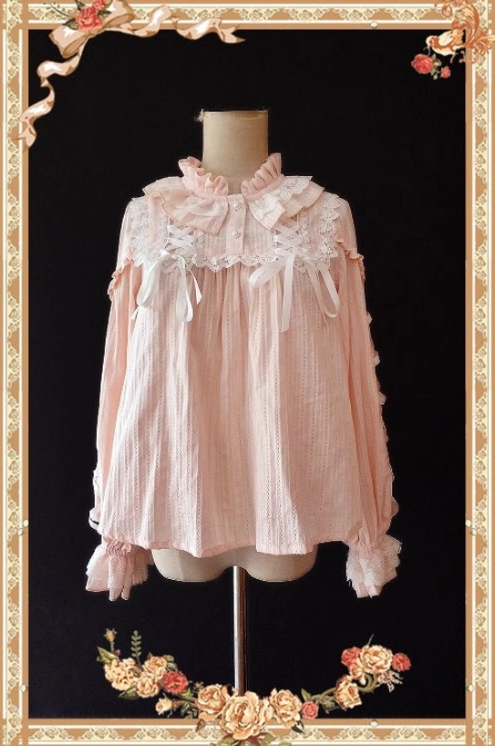 Warm Tea pink cotton lolita blouse front display with bow-adorned ruffled collar lace chest overlay and flared ruffled cuffs