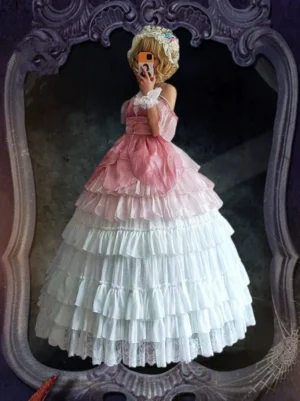 Pink ombre wedding lolita petticoat front view with layered ruffled skirt and off-shoulder design displayed on blonde model with ornate mirror background