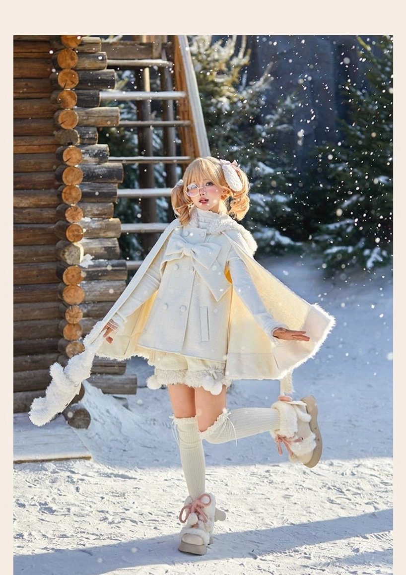 White A-line lolita coat and shorts ensemble with back bow and frilled hem worn by dynamic running model with knee-high socks and lace-up casual shoes in snowy wooden house yard