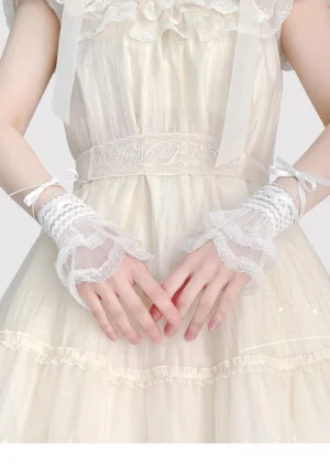 white-celestial-ballet-bridal-lolita-wrist-cuffs-layered-ruffled-lace-on-model-wearing-cream-vintage-lolita-dress-front-view