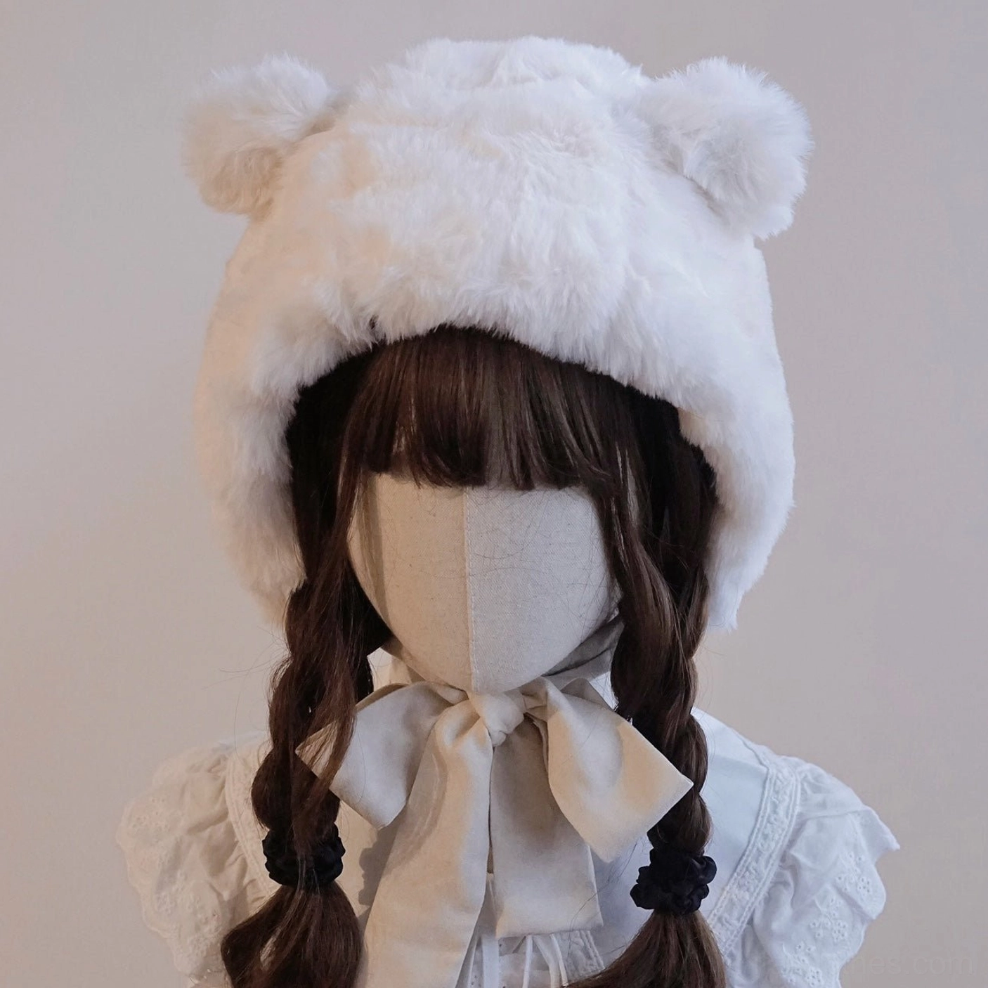 Milk white plush bear ear fluffy hooded lolita winter hat displayed on mannequin with cute bear ear details