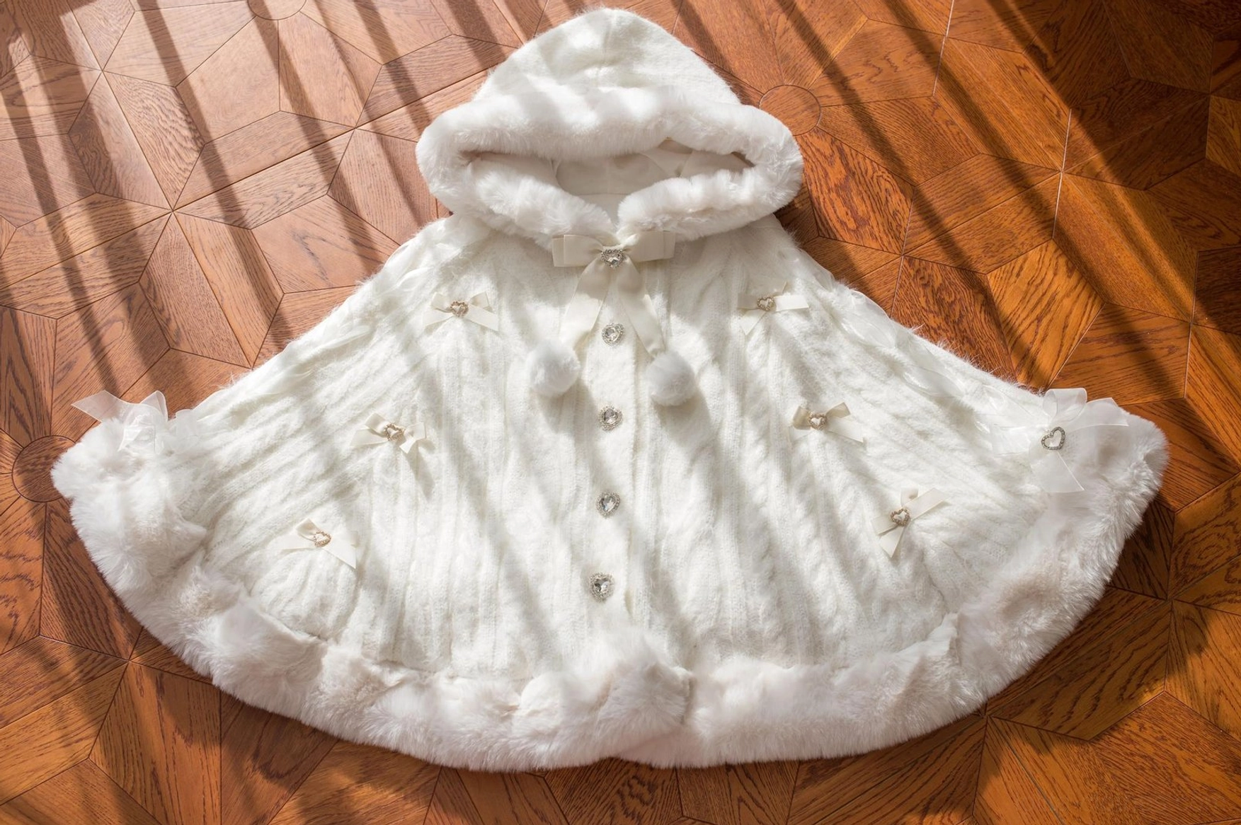 White-blue lolita winter cape coat variant showing cool-toned color blend perfect for gothic-leaning aesthetic with cartoon-print lolita skirt pairing