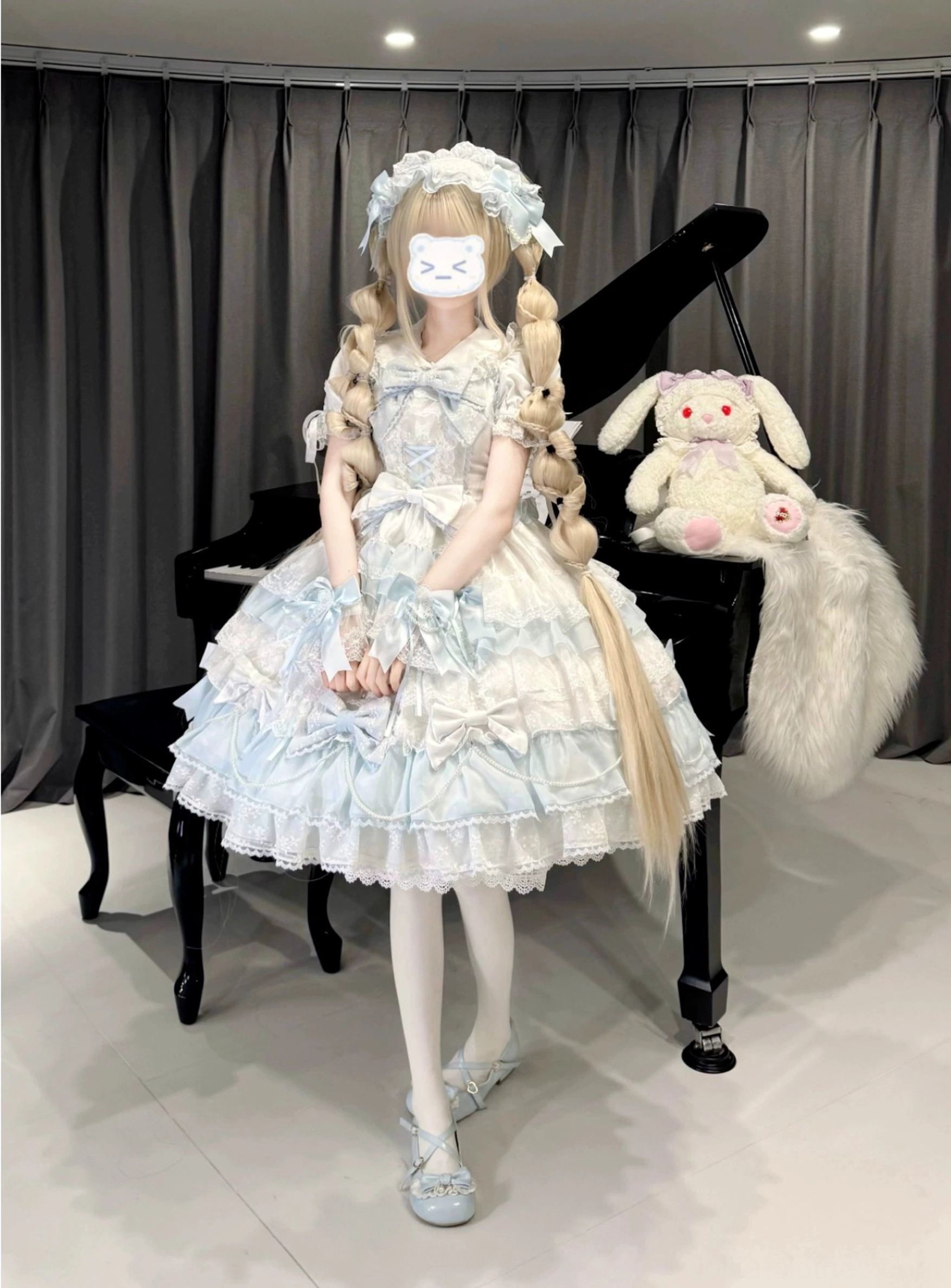White and blue lolita dress and accessories laid out showing complete coordinating set color palette and matching elements