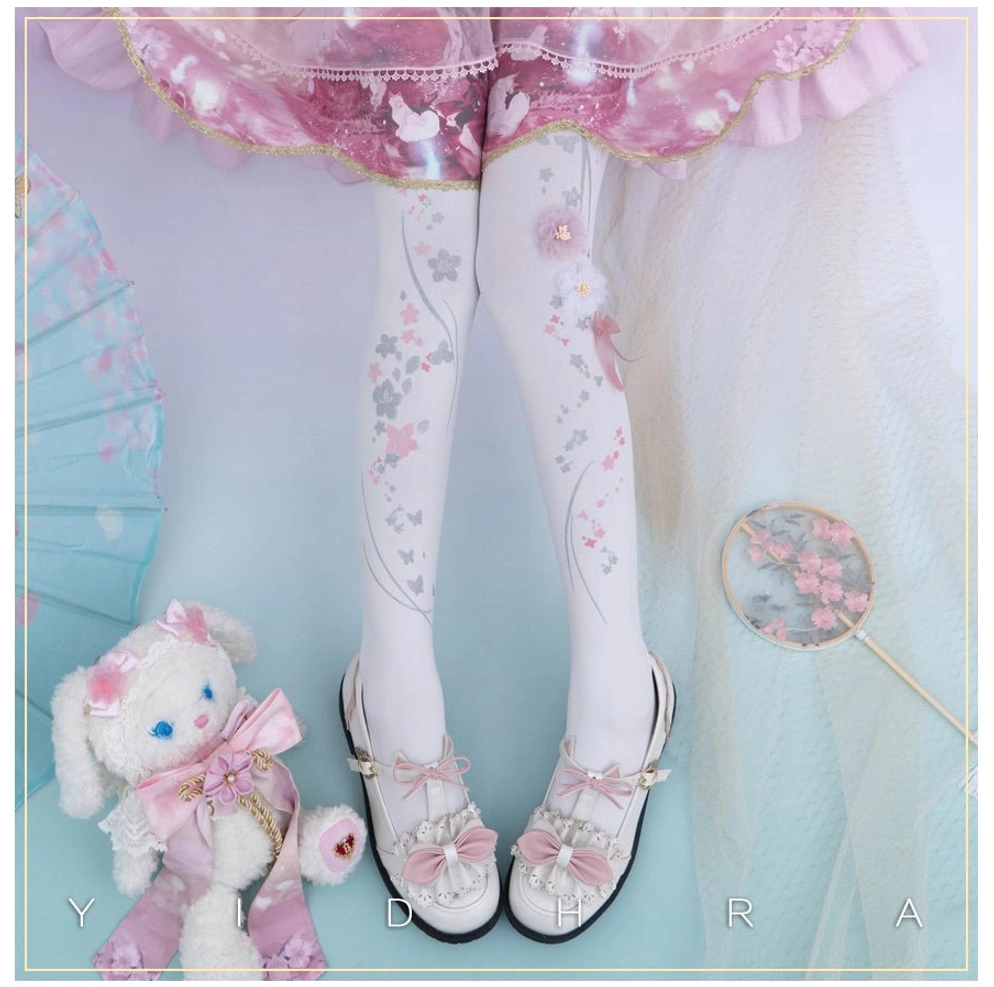 White cherry blossom qi lolita pantyhose 3d floral design with pink grey sakura print and ribbon bows side view with rabbit toy