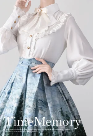 White chiffon Lolita blouse with detachable bow tie puff mutton sleeves and gold buttons coordinate with landscape print skirt