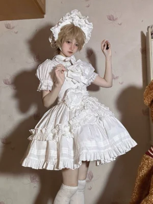 White classic Lolita short dress JSK with puff sleeves lace ruffles bow neck and layered skirt hem