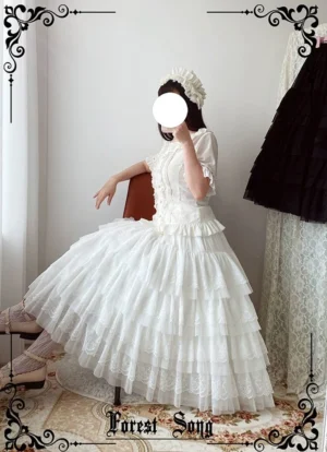 White tiered ruffle lolita petticoat rear three-quarter view on model wearing vintage lolita coordinate showing full voluminous silhouette and multi-layered construction